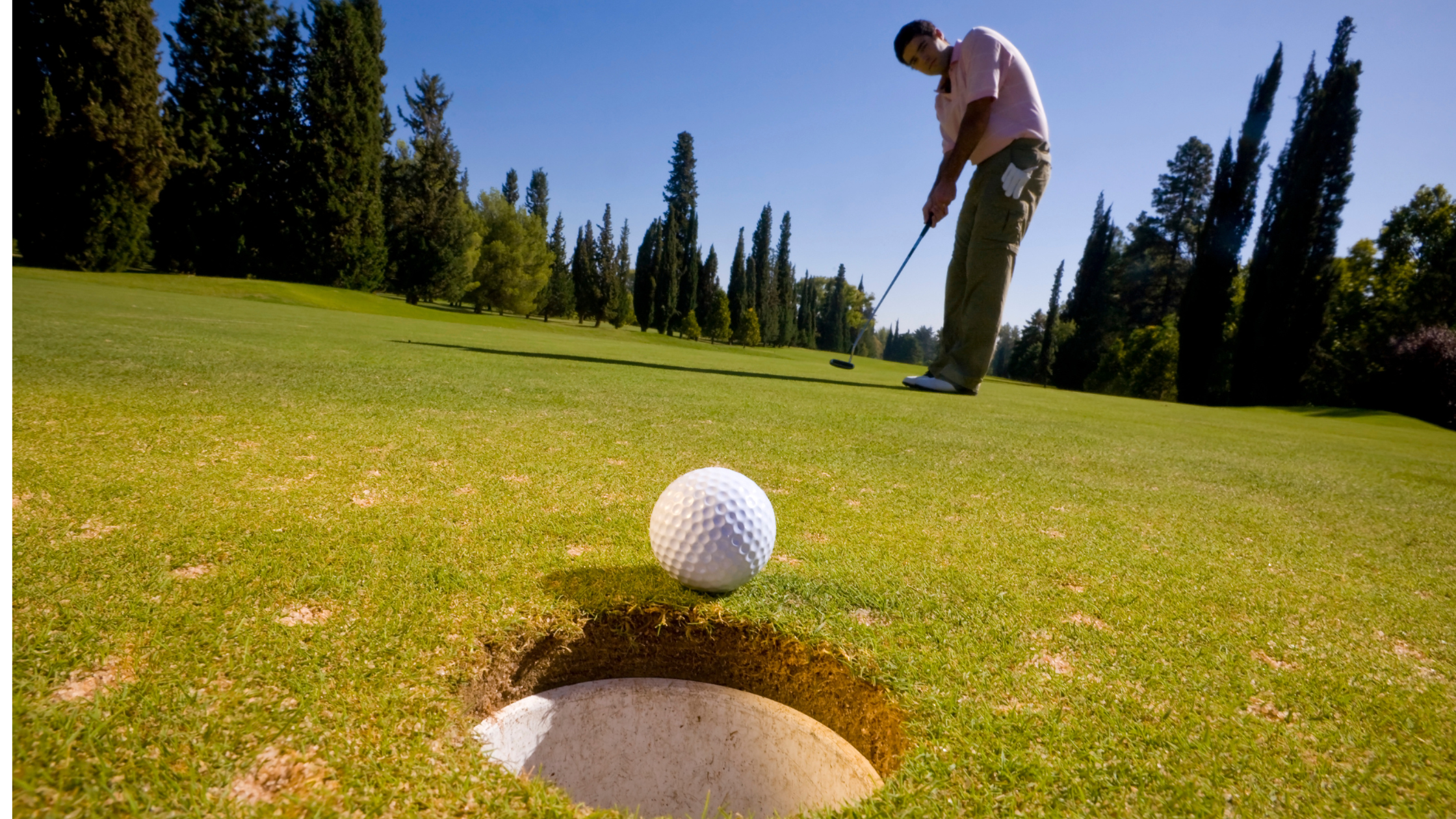 Image of golfer getting a hole-in-one
